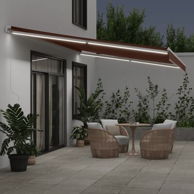 vidaXL Tenda da Sole Retrattile Manuale con LED Marrone 600x300 cm